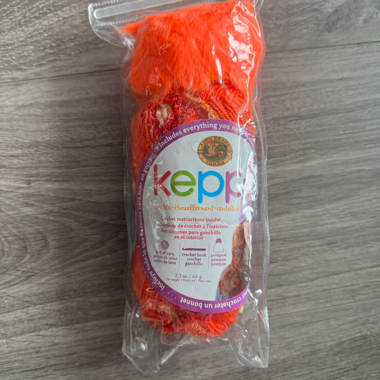 Lion Brand Yarn "Keppi" Crochet Hat Kit - Orange Fizz