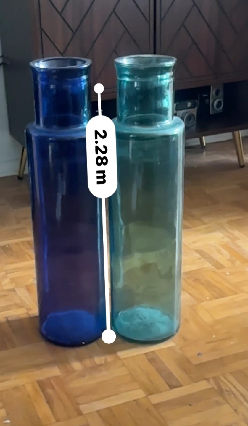 Two tall glass vases - blue and teal