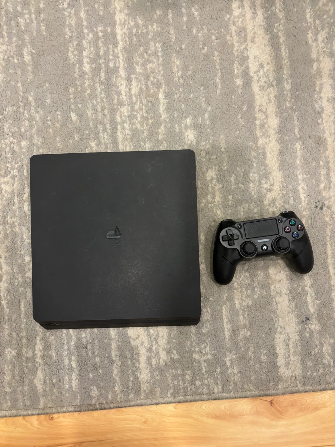 PS4 with controller and cords