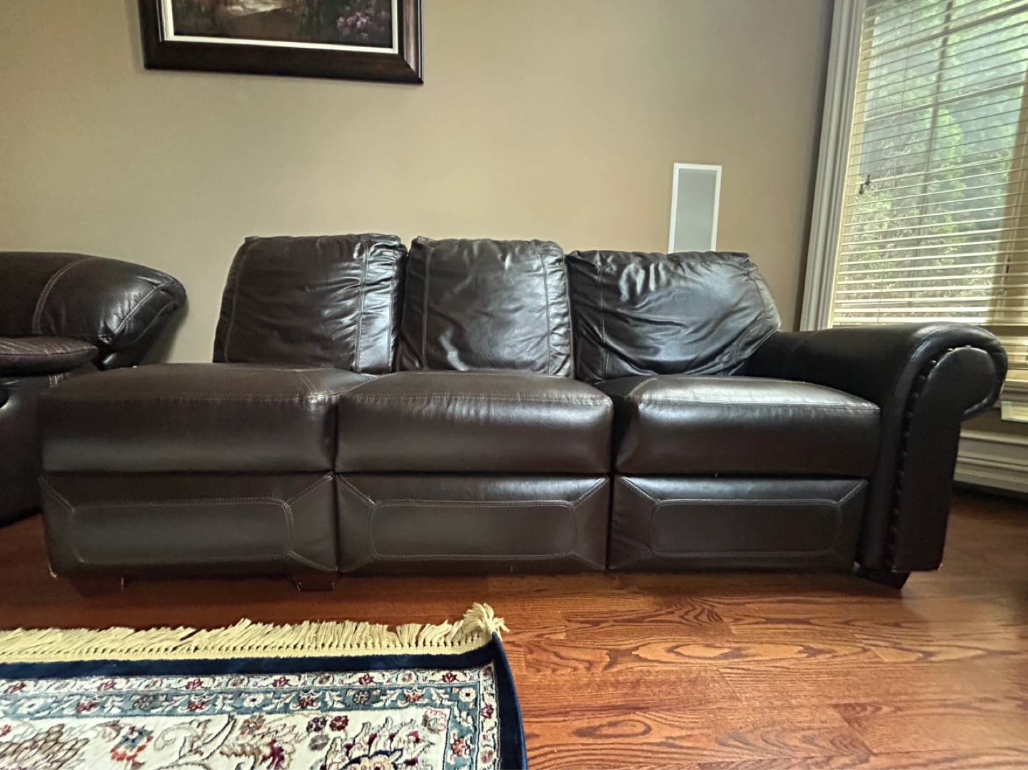 Brown Leather Reclining Sofa