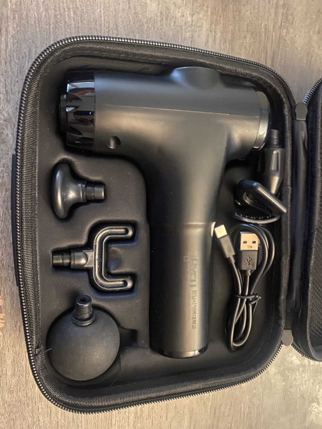 Black Massage Gun with Attachments and Case