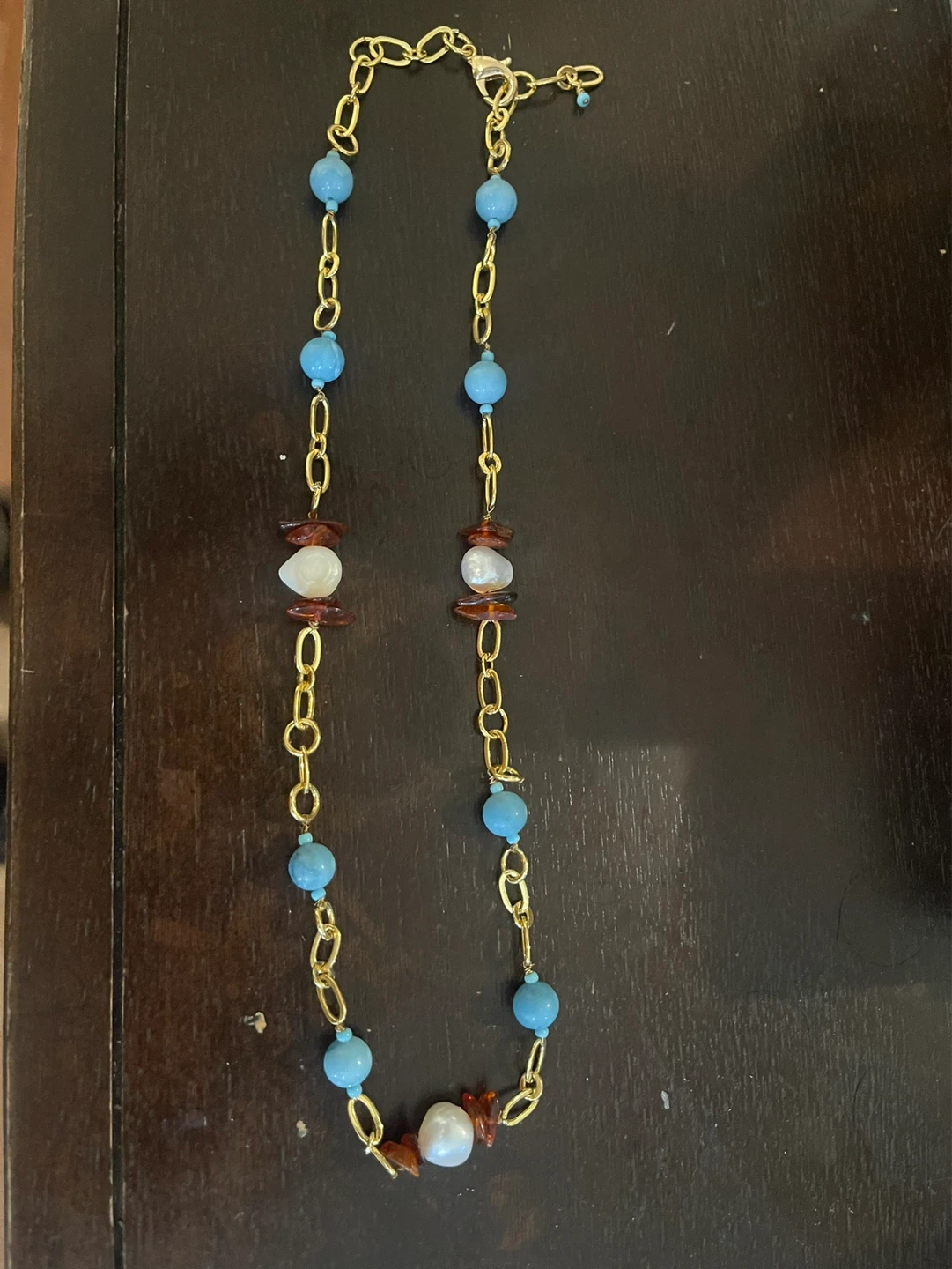 Hand made Gold tone necklace with natural larimar and pearl