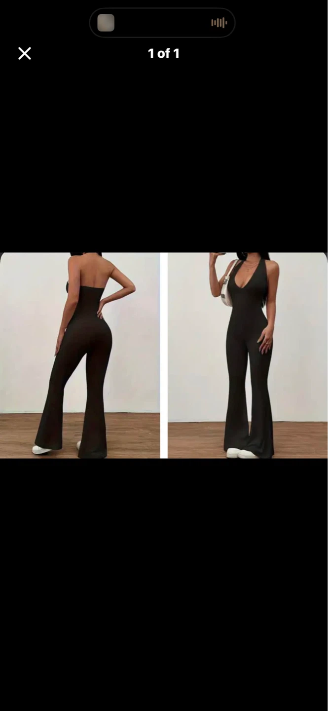 Black Ribbed Halter Neck Flare Jumpsuit. sizes med & large