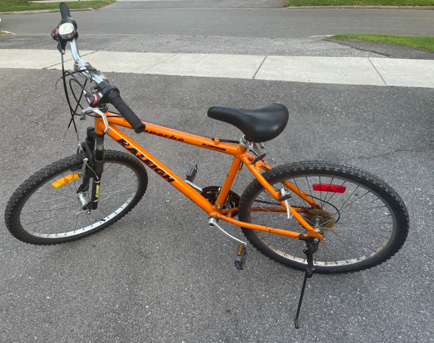 Orange Raleigh Mountain Bike