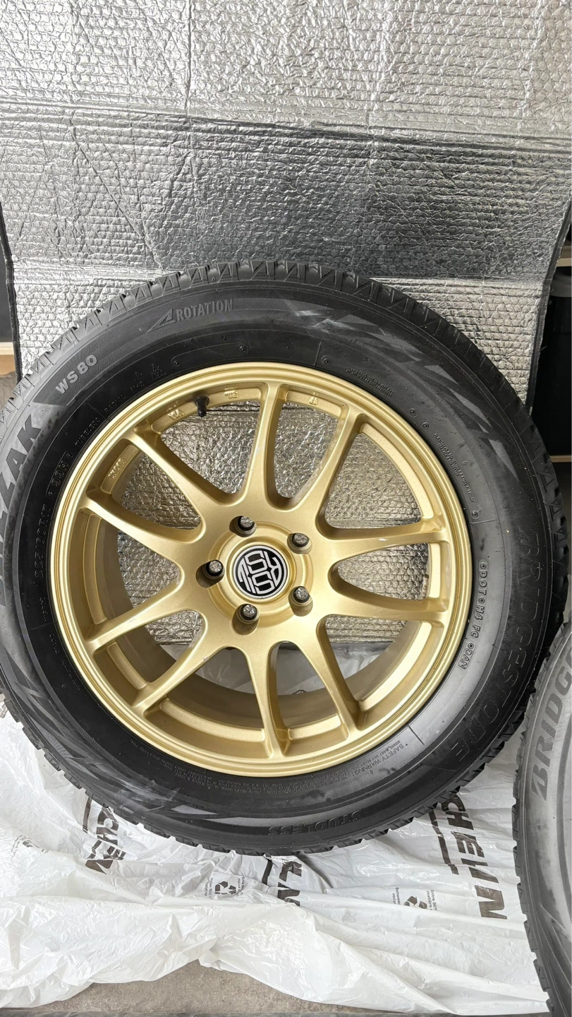 Bridgestone Blizzard Tires with Gold Rims (Set of 4)