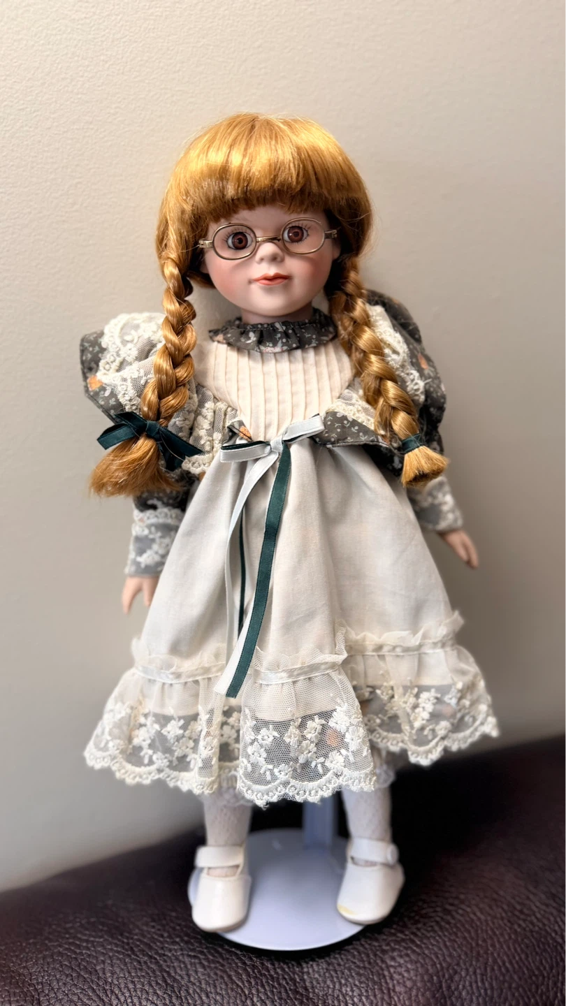 Porcelain Doll with Glasses