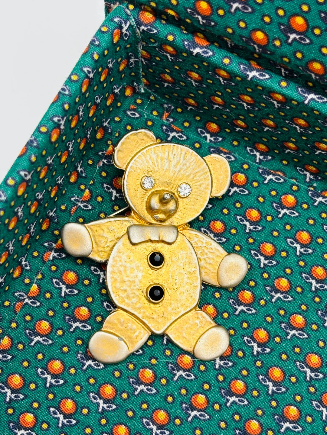 Vintage articulated teddy bear brooch