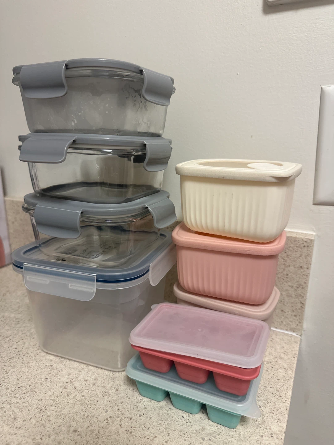 Assorted Food Storage Containers and Ice Cube Trays