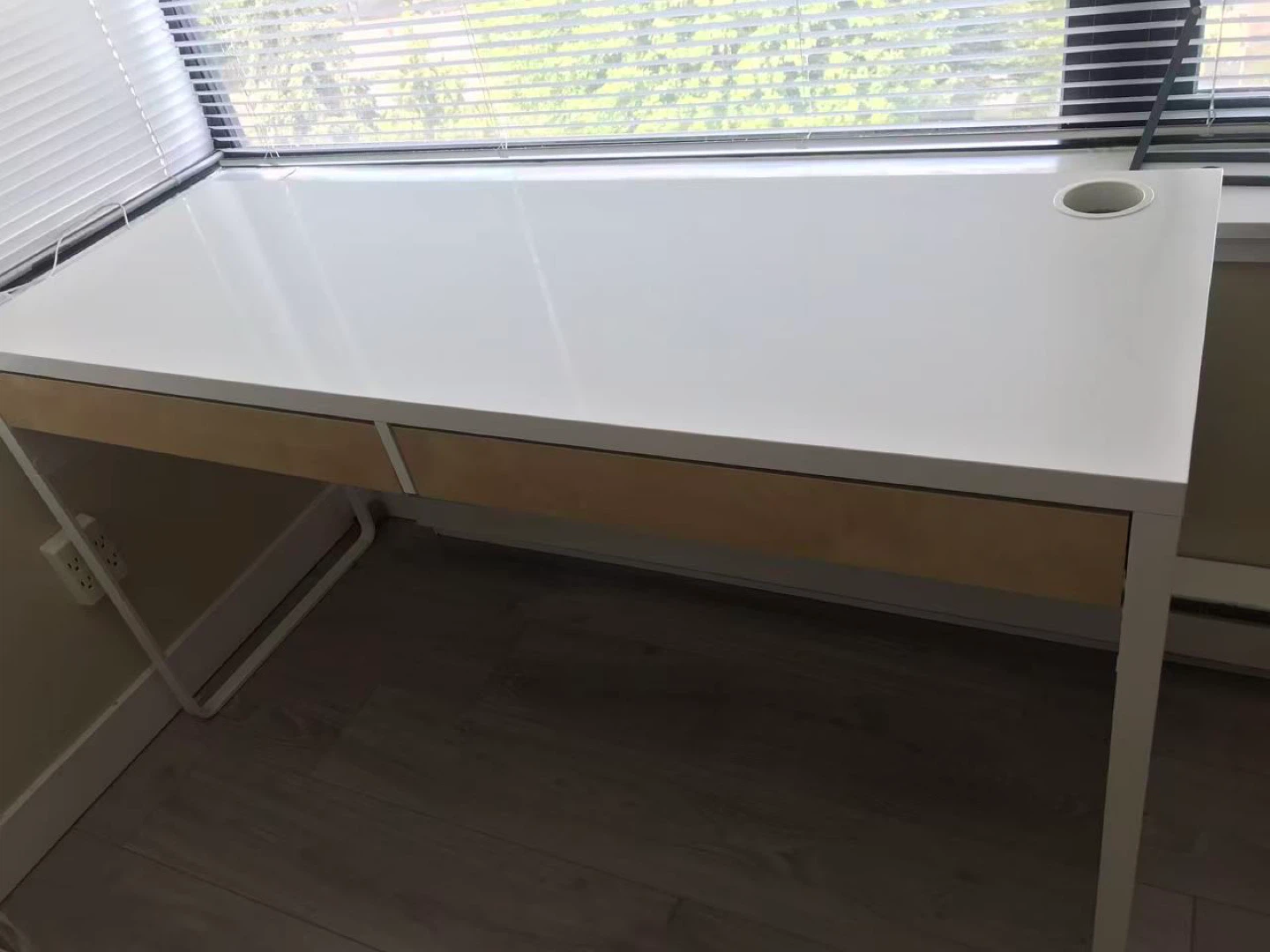 White desk with wood drawers and cup holder/grommet hold