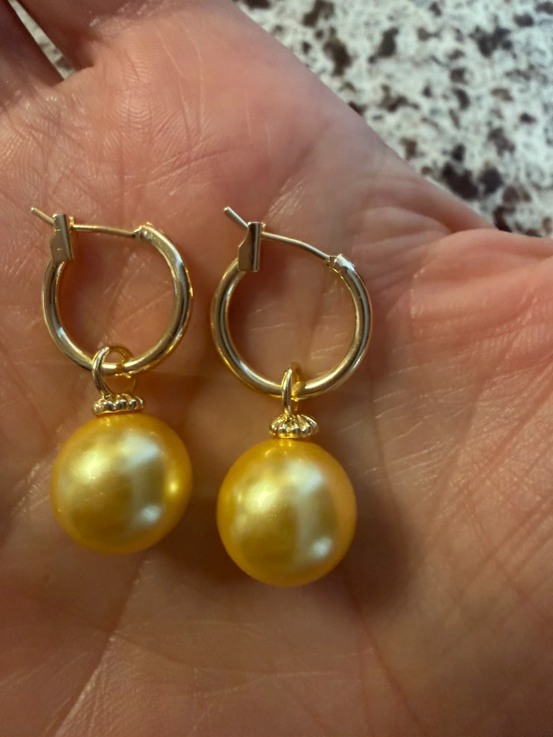 Gold pearl earrings