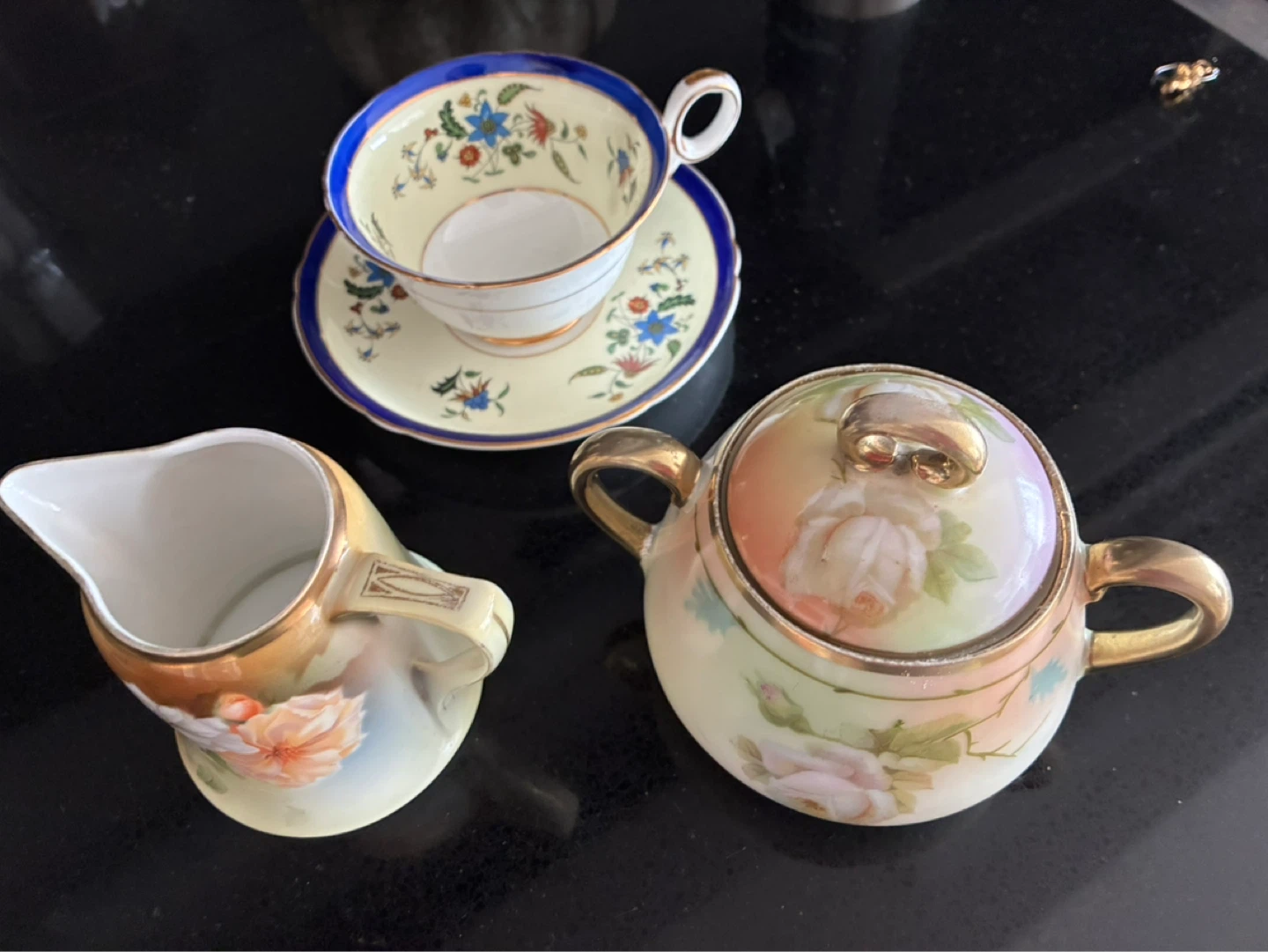 Vintage Teacup, Saucer, Creamer, and Sugar Bowl Set - photo 2