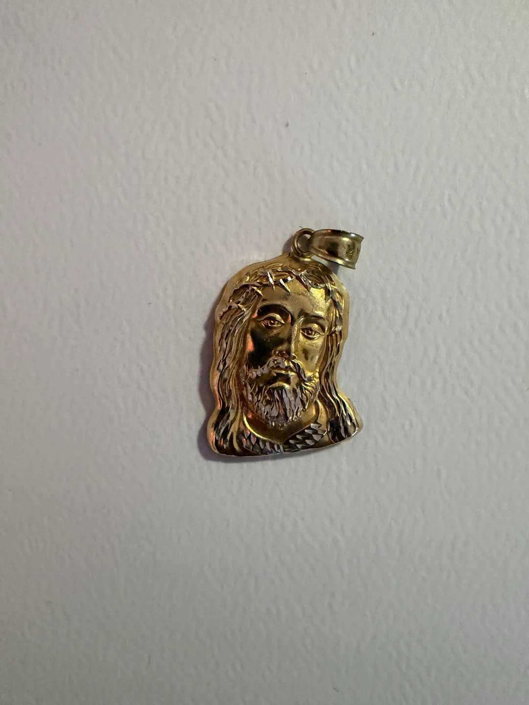 10K gold Jesus pendant and 14K gold earring