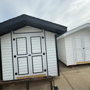 White Storage Shed with Black Trim