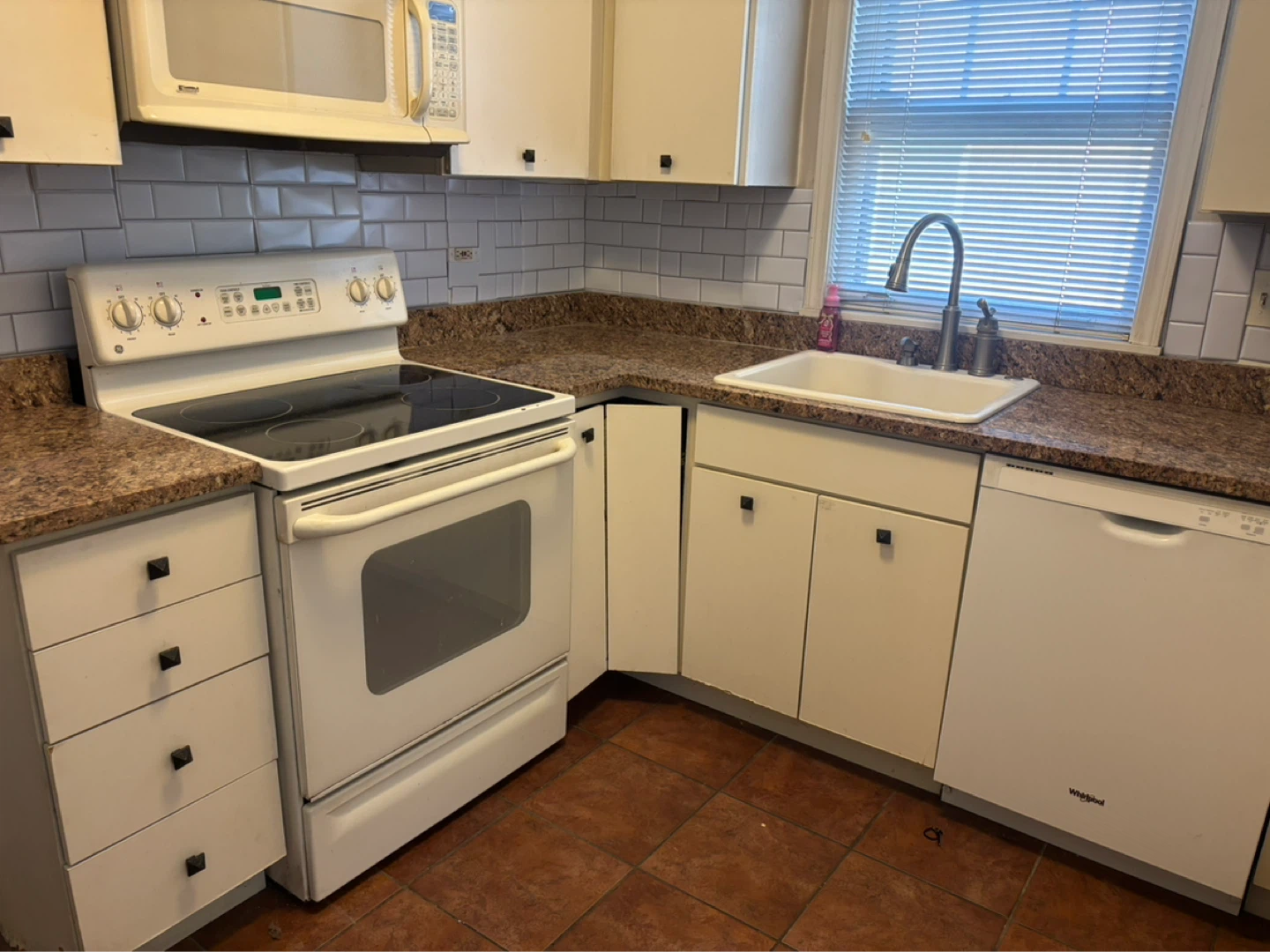 GE Electric Stove and Whirlpool Dishwasher