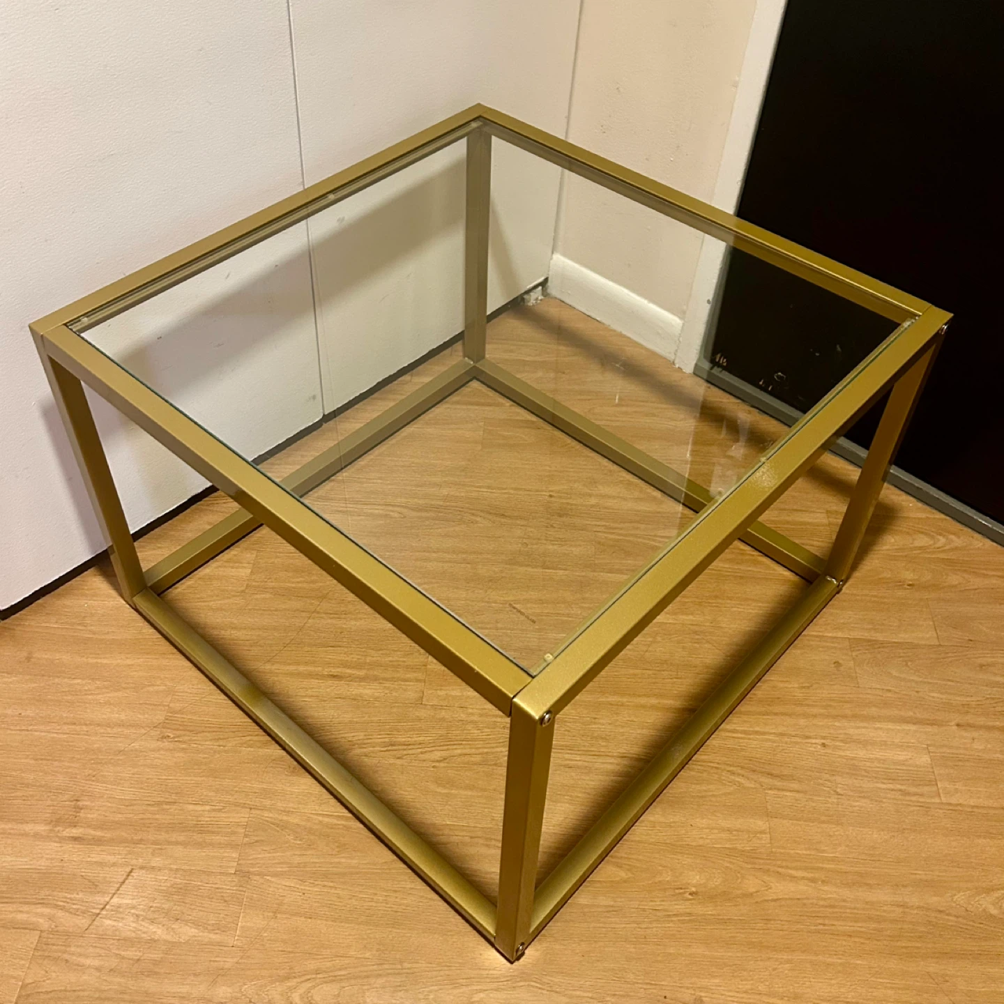 Coffee Table with Glass Top and Brass color metal frame