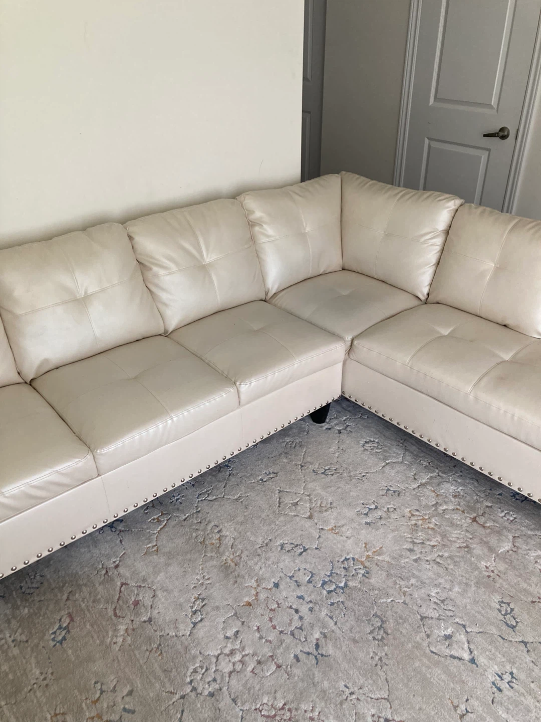 Cream Sectional Sofa with Studded Detail