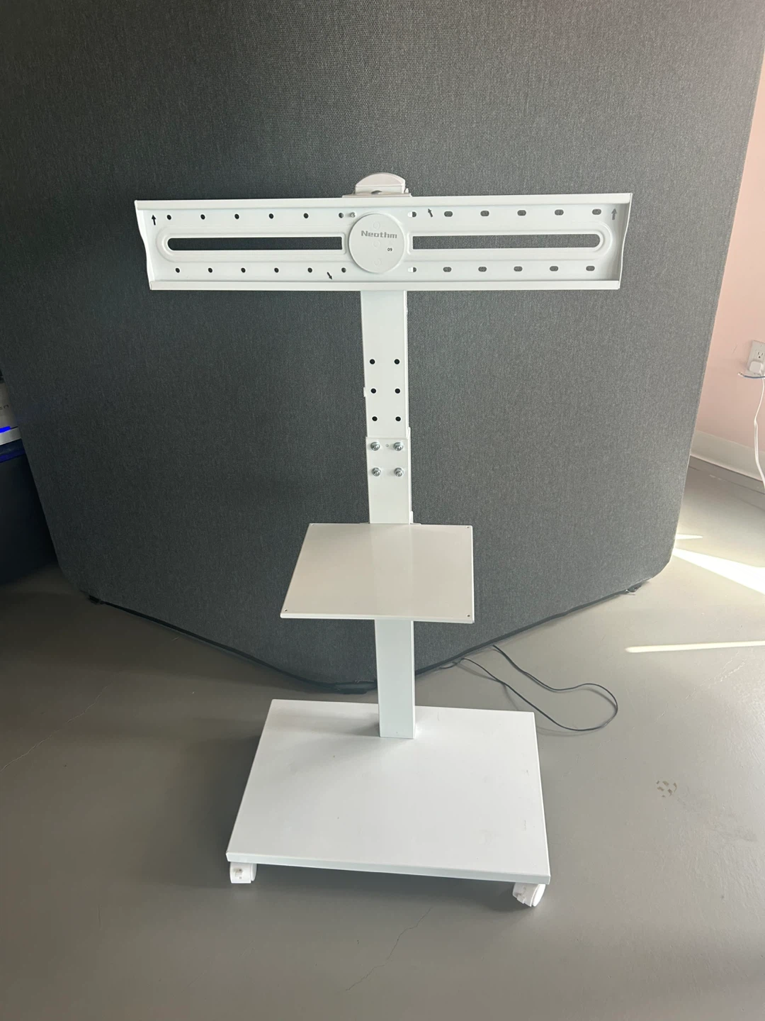 White Rolling TV Stand with Shelf