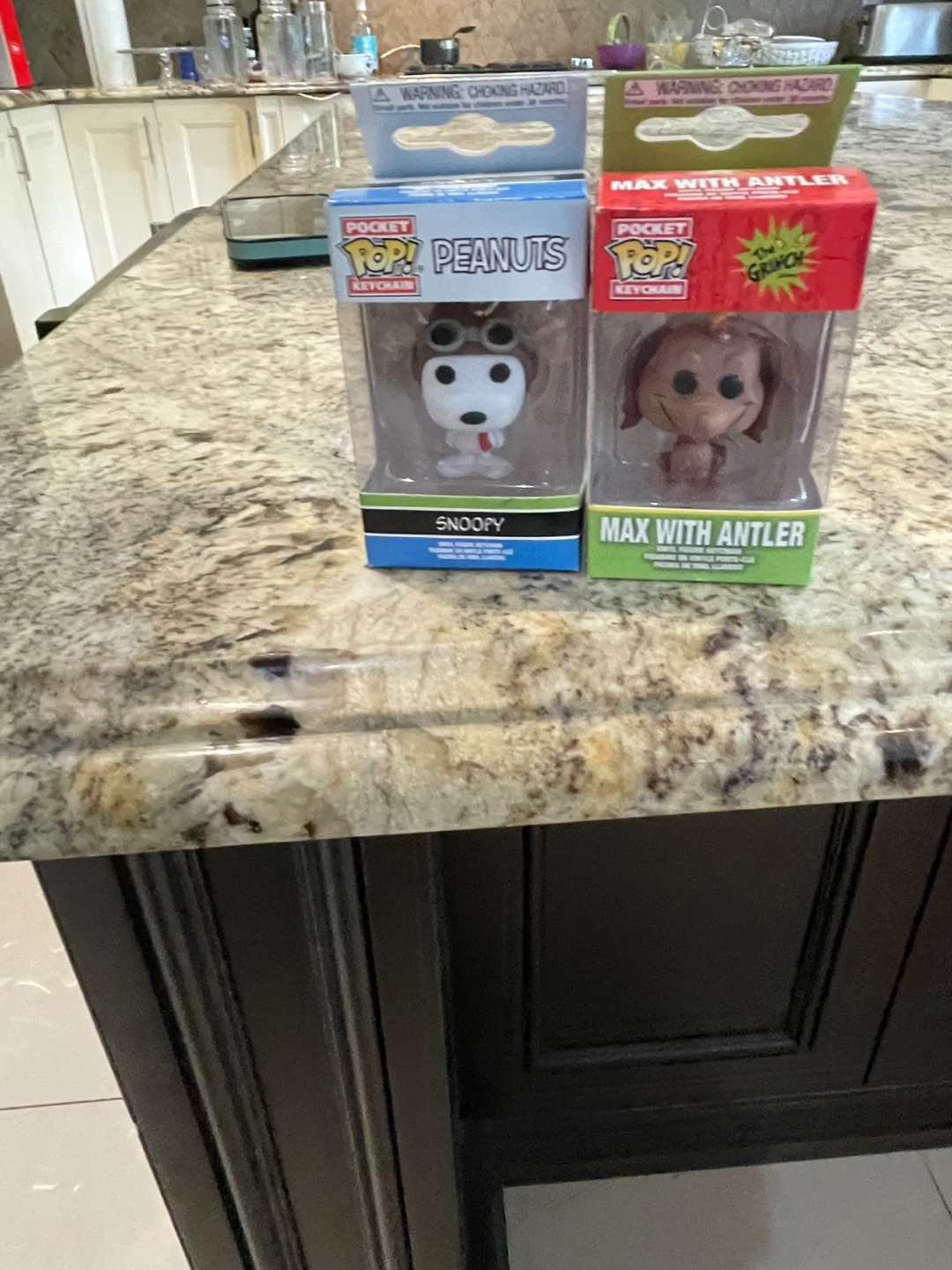 Miniature Snoopy and The Grinch Max Funko Pop keychains