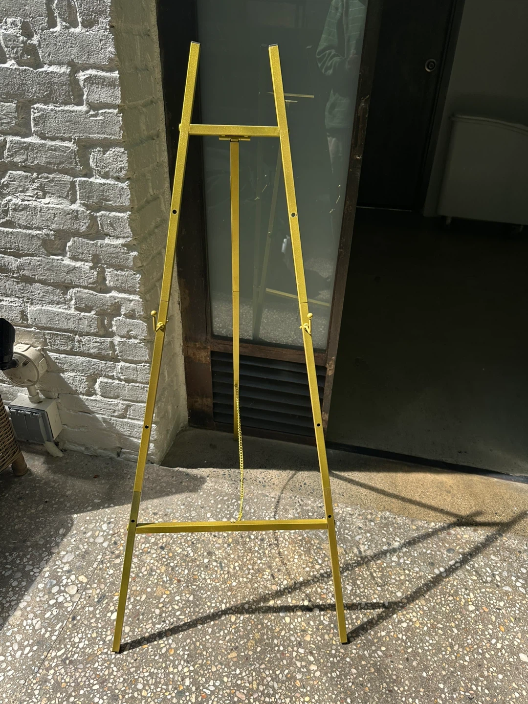Yellow Metal Easel Stand