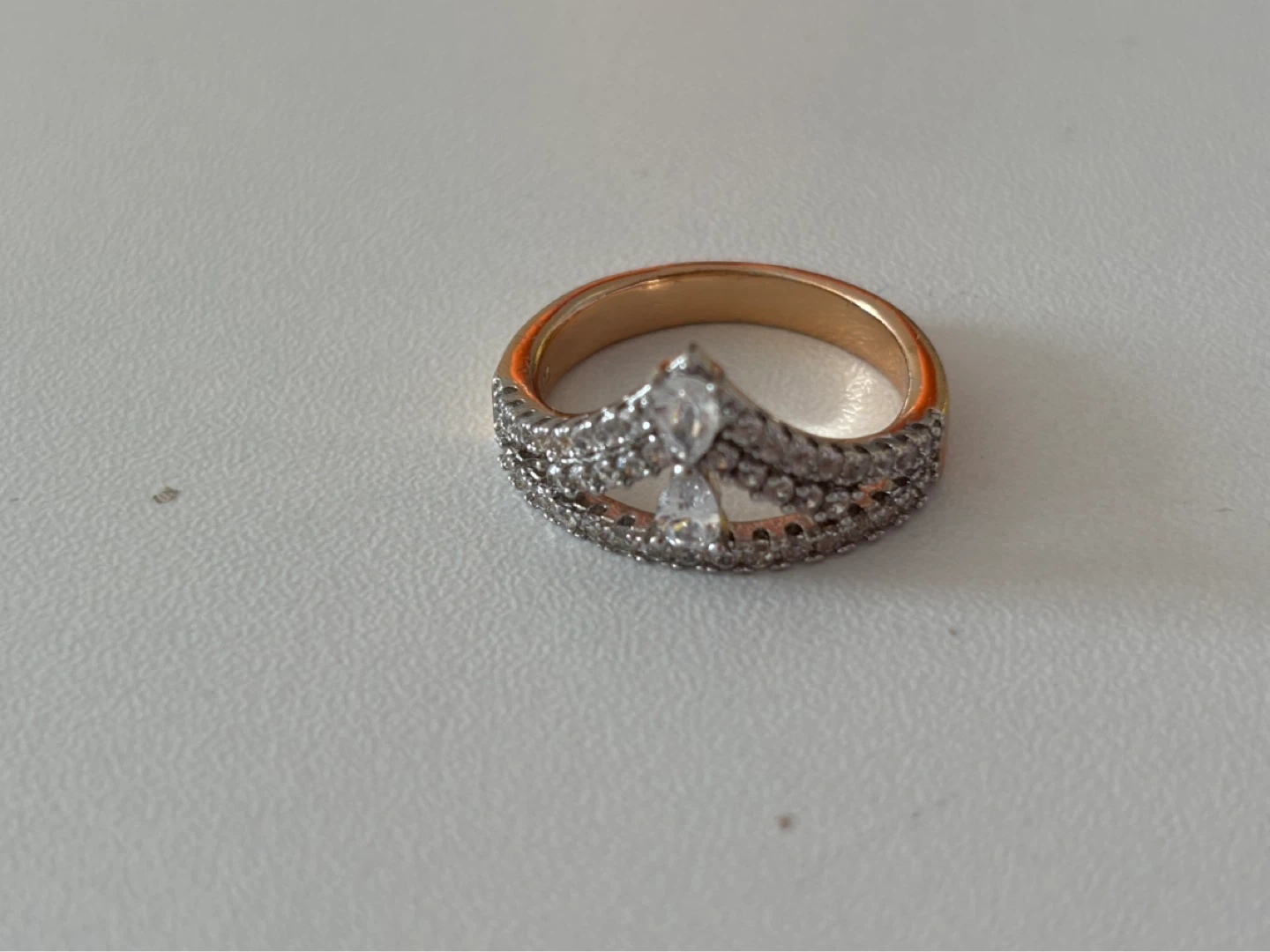 Gold-tone Ring with Pave and Pear-Shaped Stones