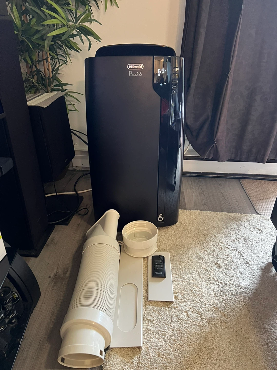 As new Delonghi 14,000btu with remote and accessories.