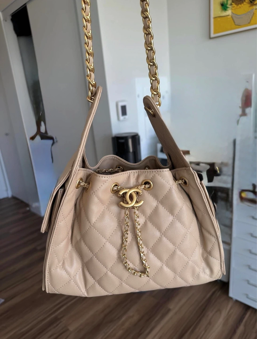 Chanel 25 beige leather with gold hardware