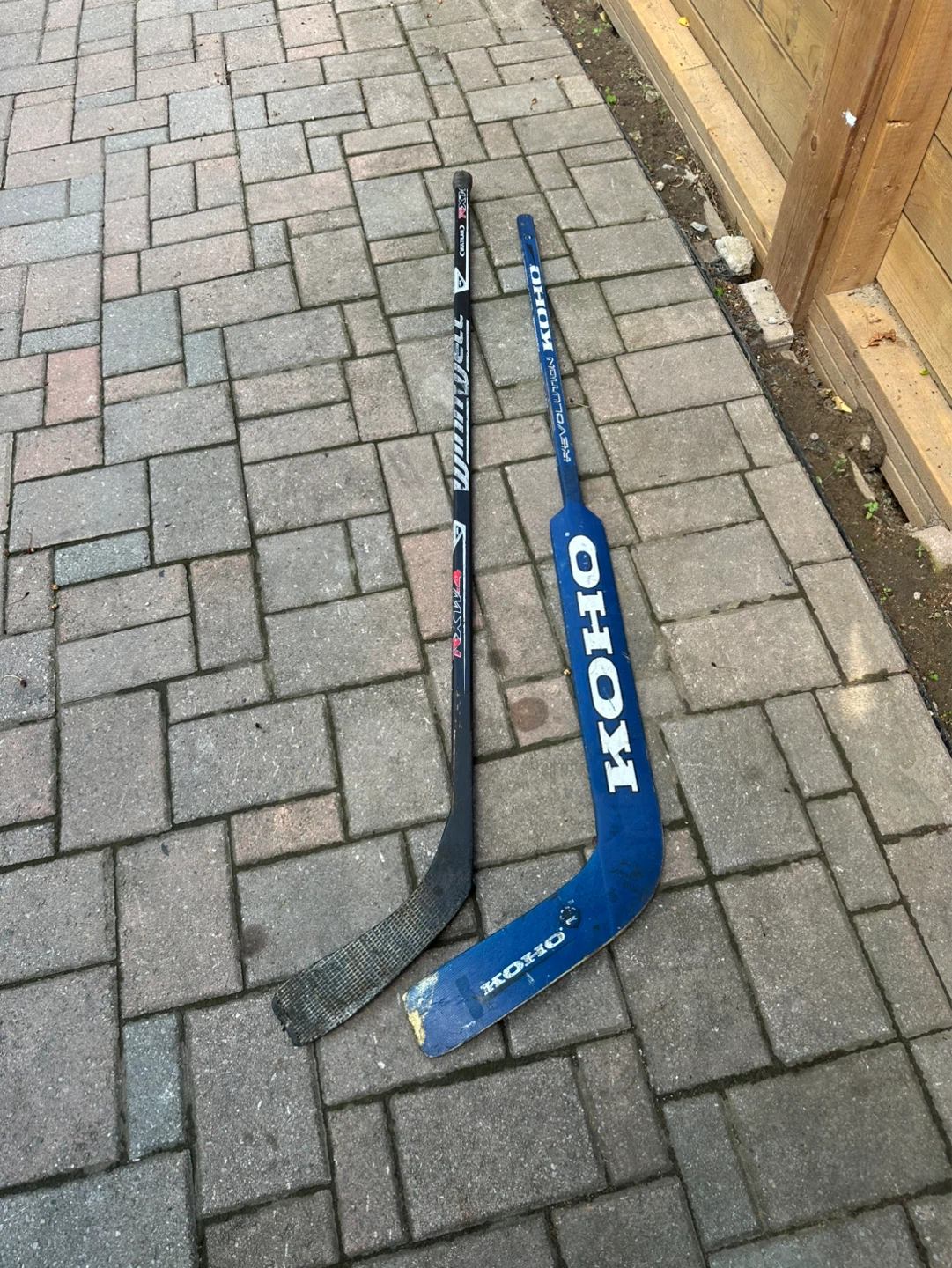 Two Hockey Sticks - KOHO and Winnwell
