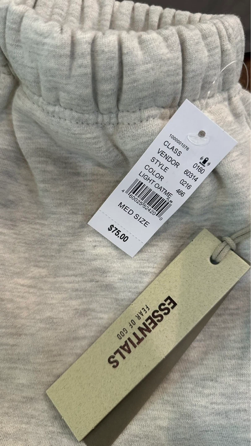 ESSENTIALS Fear of God Light Oatmeal Sweat Shorts - photo 2