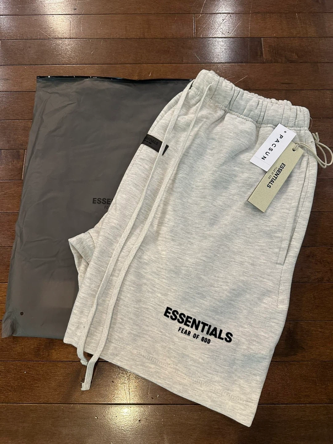 ESSENTIALS Fear of God Light Oatmeal Sweat Shorts