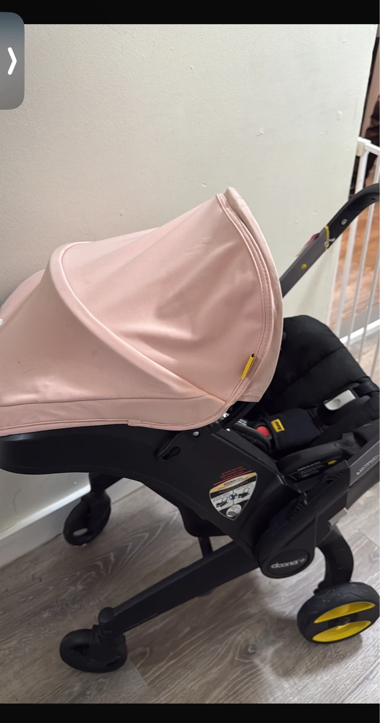 Doona Infant Car Seat & Stroller - Pink