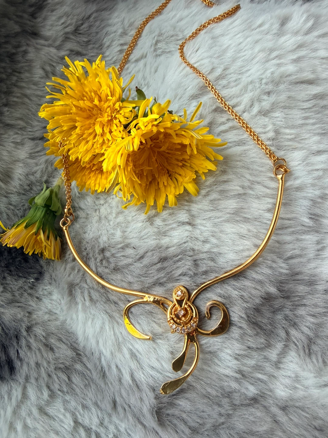 Gold-toned necklace with sparkling accents