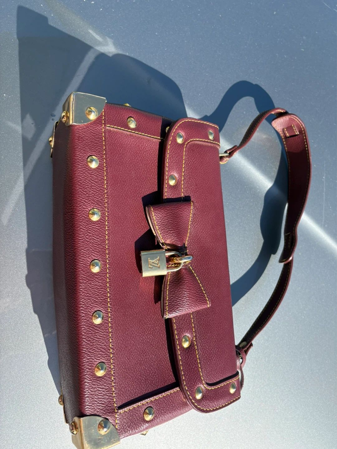 Louis Vuitton Burgundy Leather Bow Lock Backpack