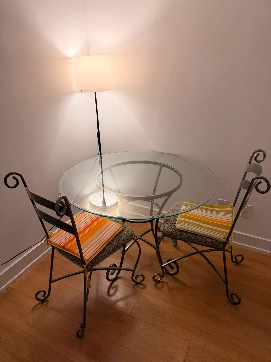 Glass table with four chairs