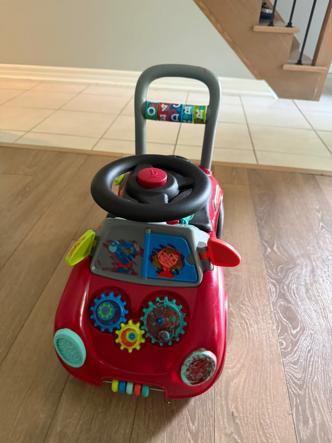 Red Ride-On Toy Car with Steering Wheel
