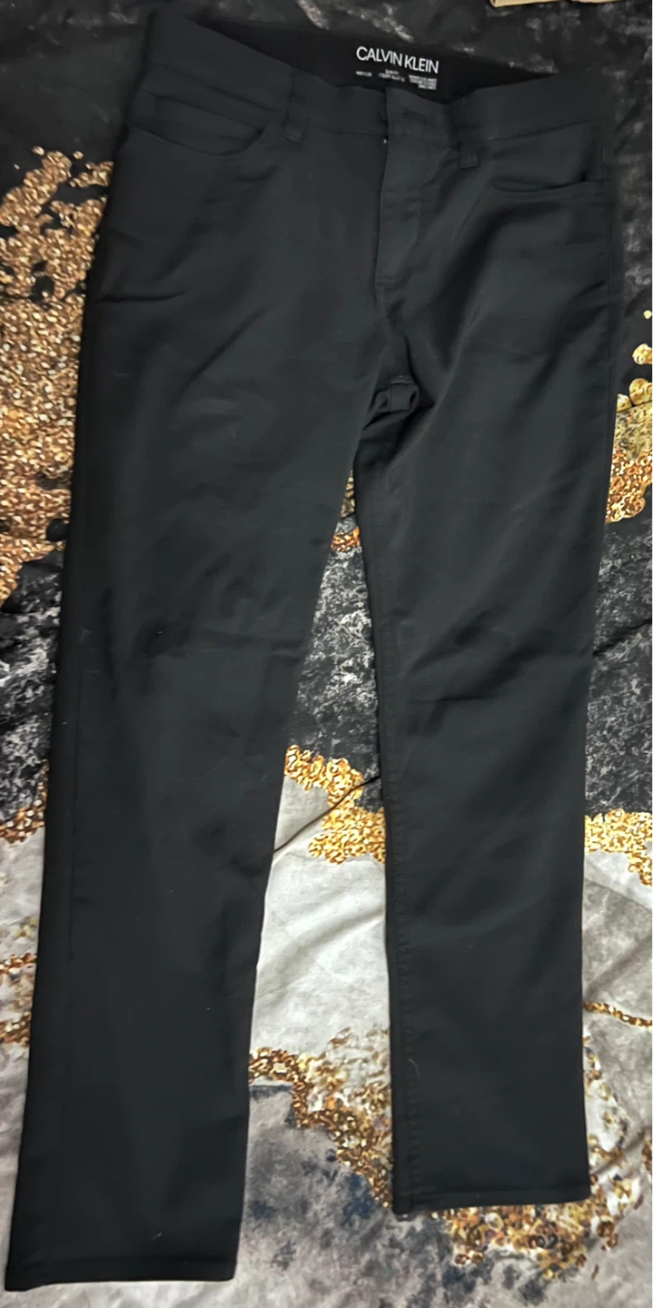 Assorted Pants/Shorts: 28-30/30