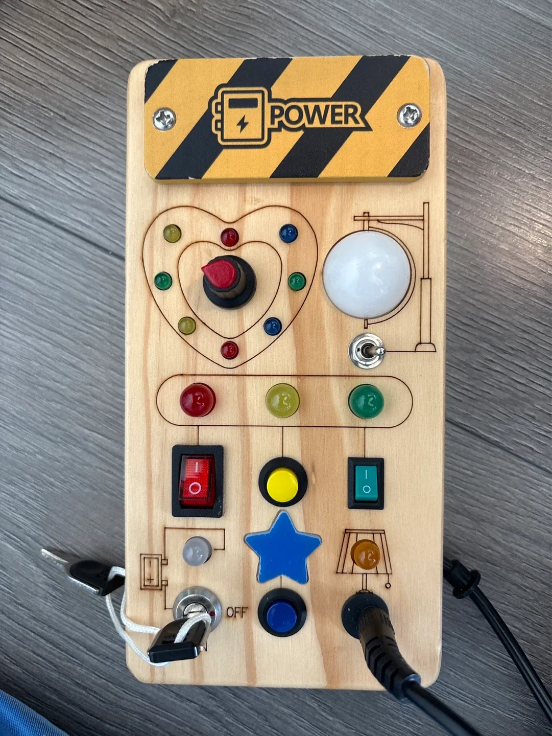 Wooden Busy Board with Power Theme
