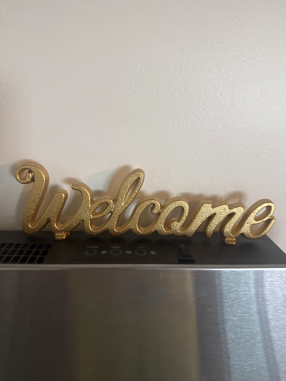 Gold "Welcome" Sign