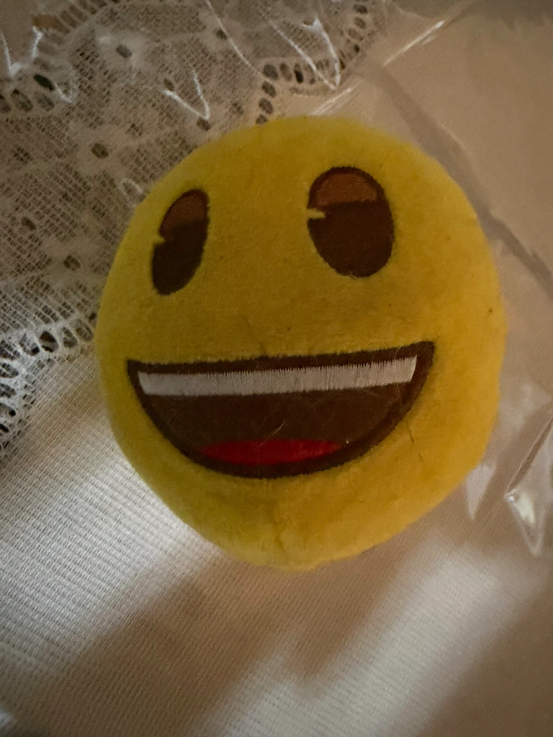 FREE Yellow Smiley Face Plush Toy