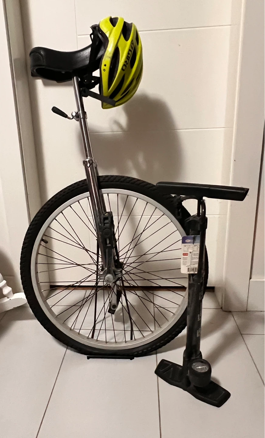 Unicycle with GIRO Helmet and Pump