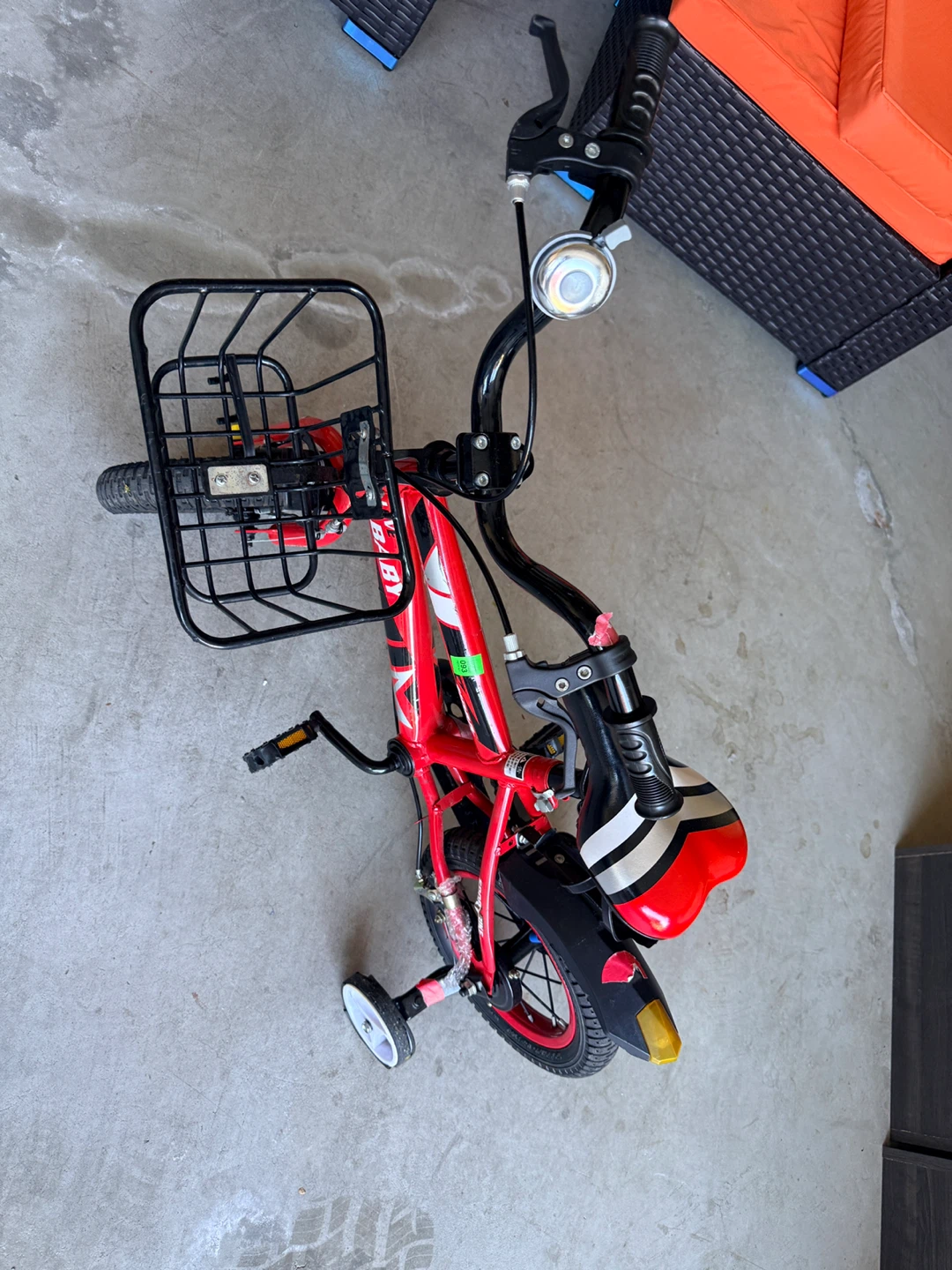 Red Kids Bike , back wheel wobbles need bit adjustment