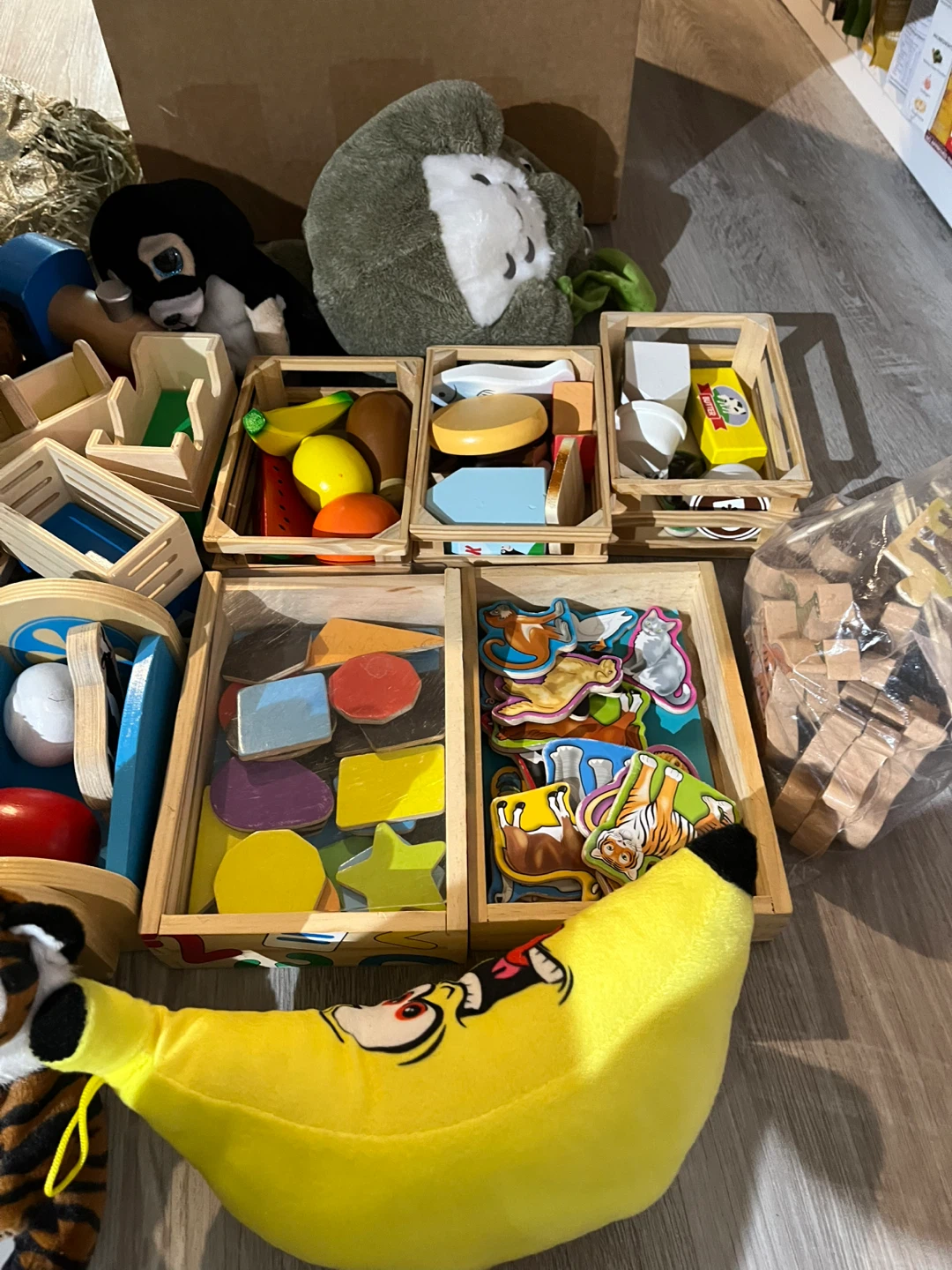 Assorted wooden toys and plushies