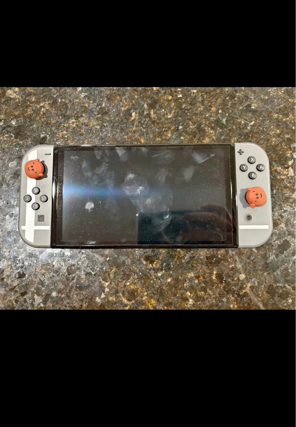 Nintendo Switch Console - Gray with Cute Orange Thumb Grips