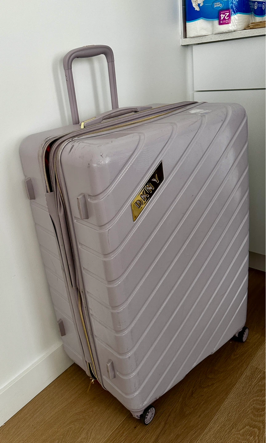DKNY Luggage - Purple- only zip need to be fixed