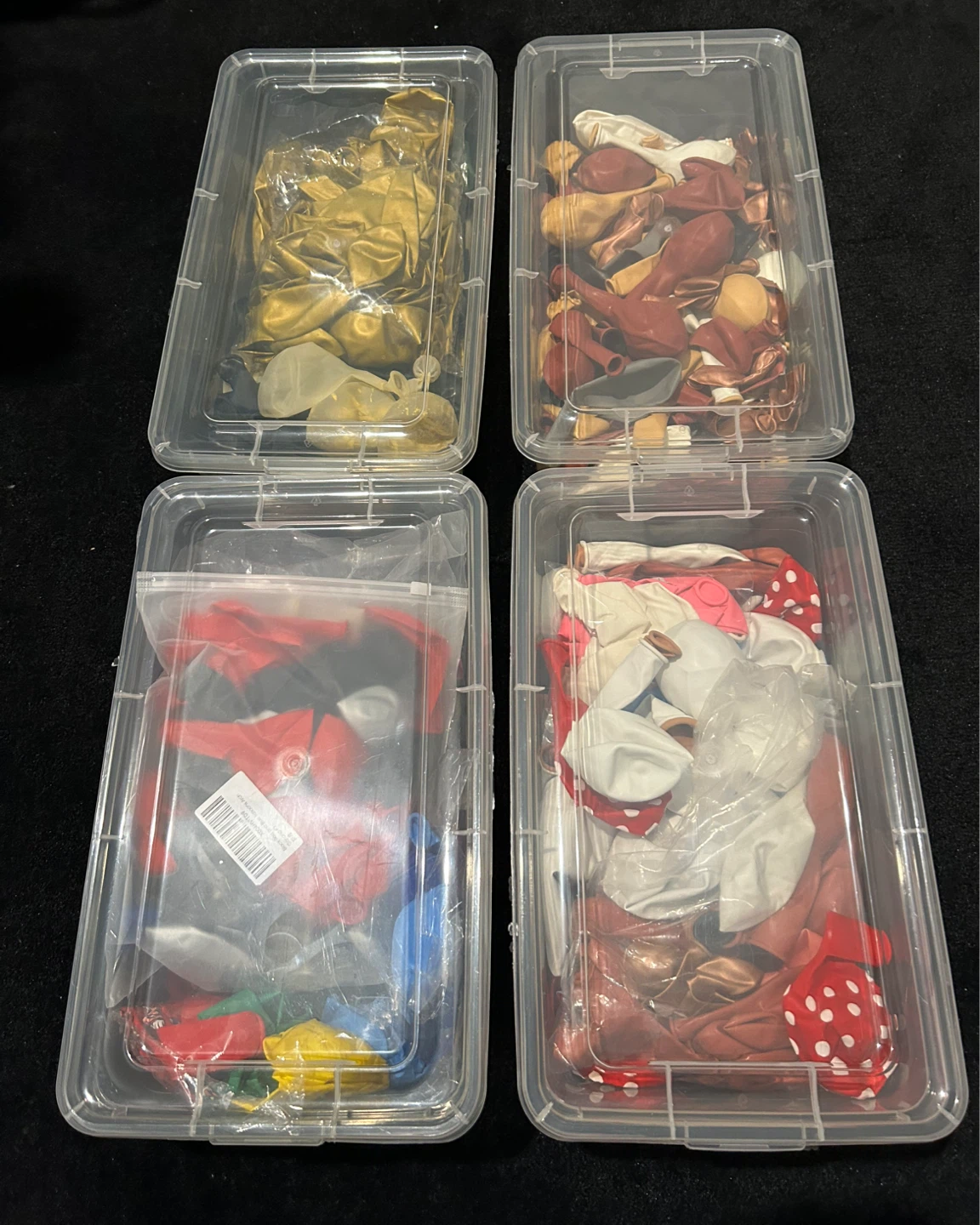 Assorted Balloons in Storage Bins