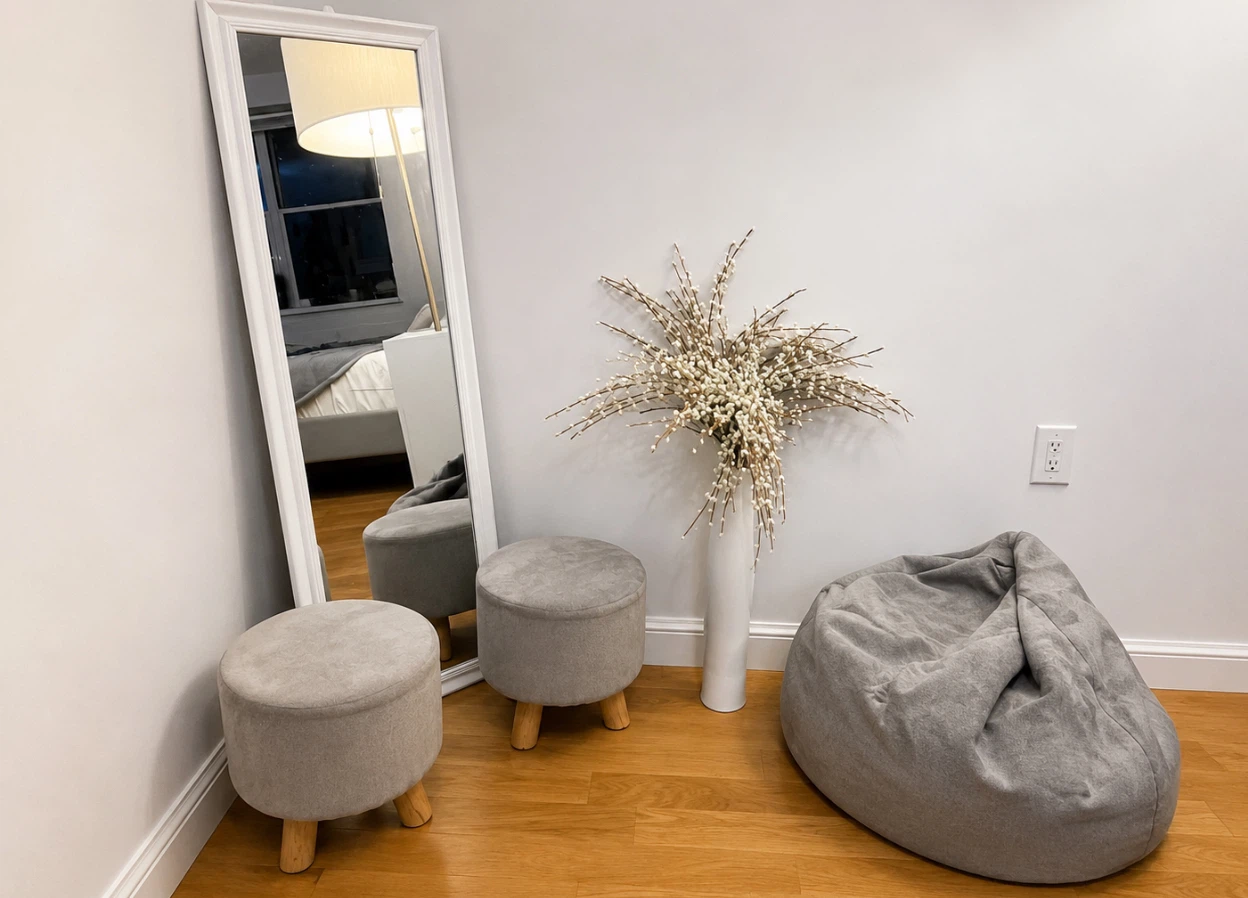 Grey mirror and ottoman set up