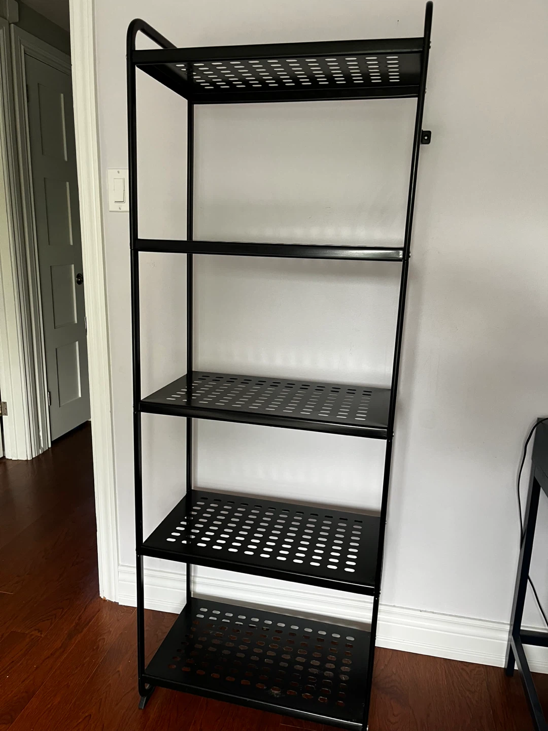Black metal shelving unit