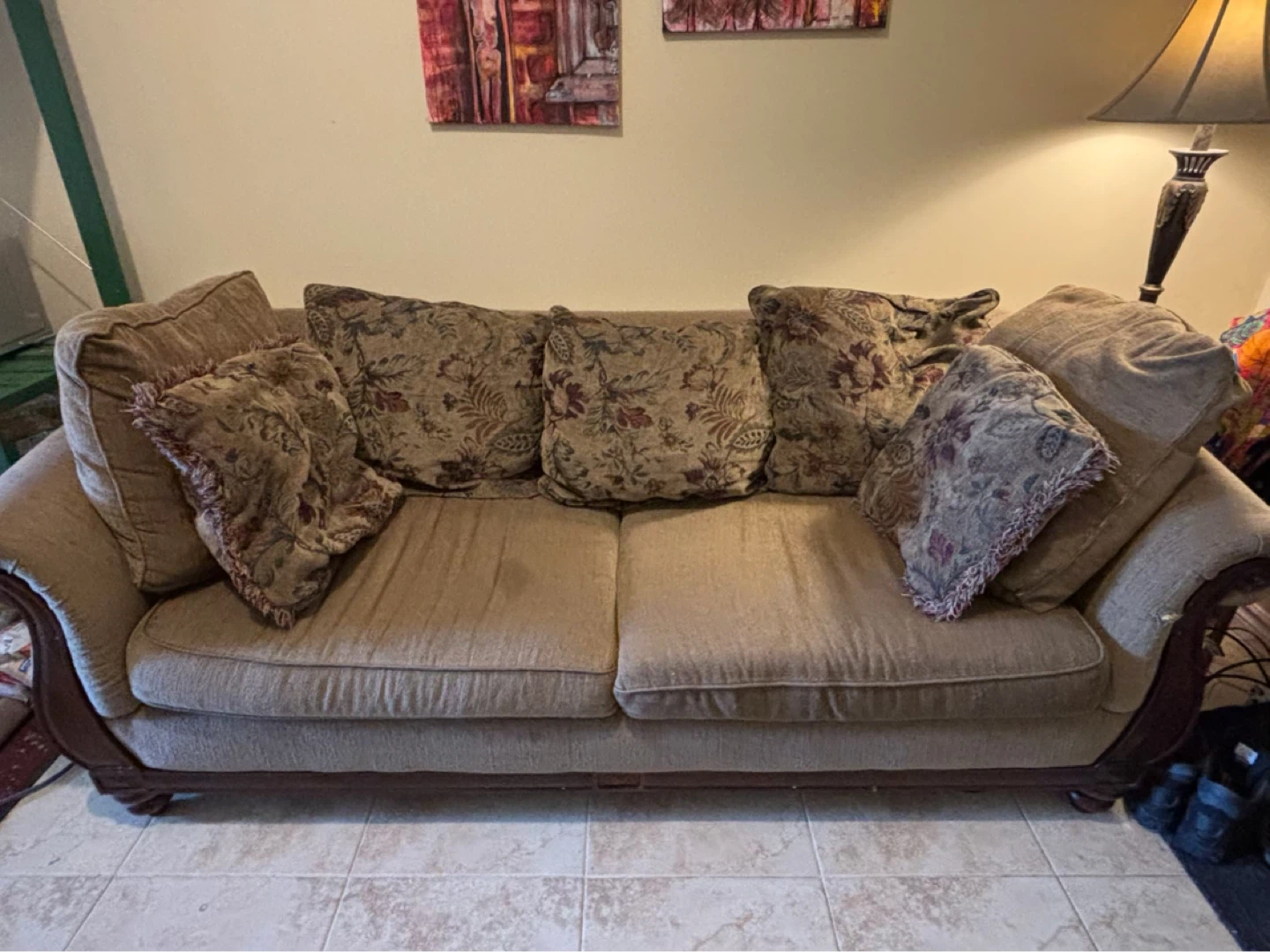 Free Tan Sofa with Decorative Pillows