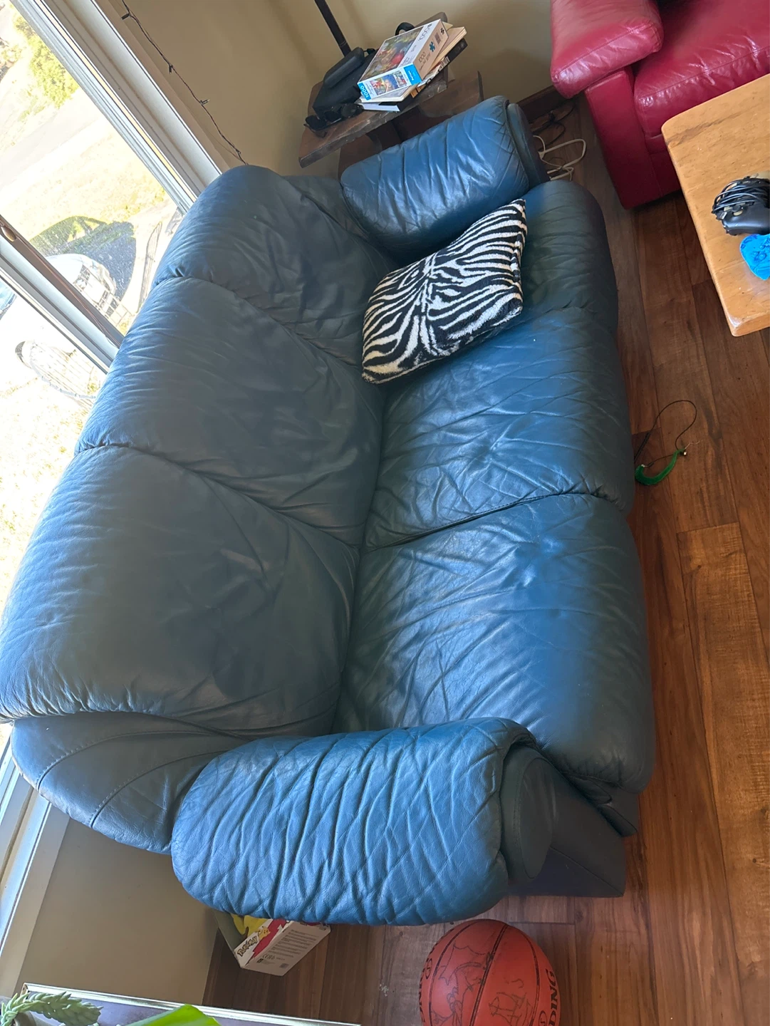 Blue and red leather sofas