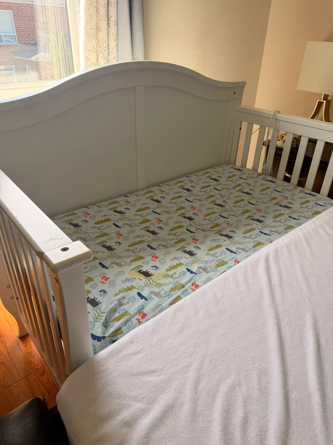 White convertible crib with mattress