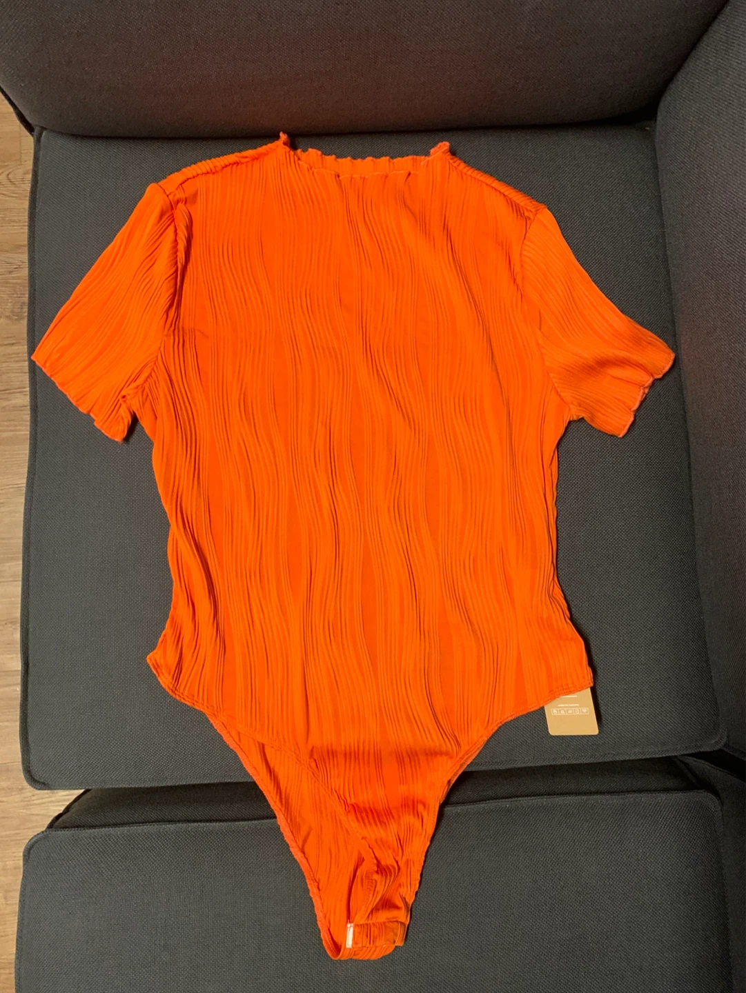 Orange Ribbed Bodysuit